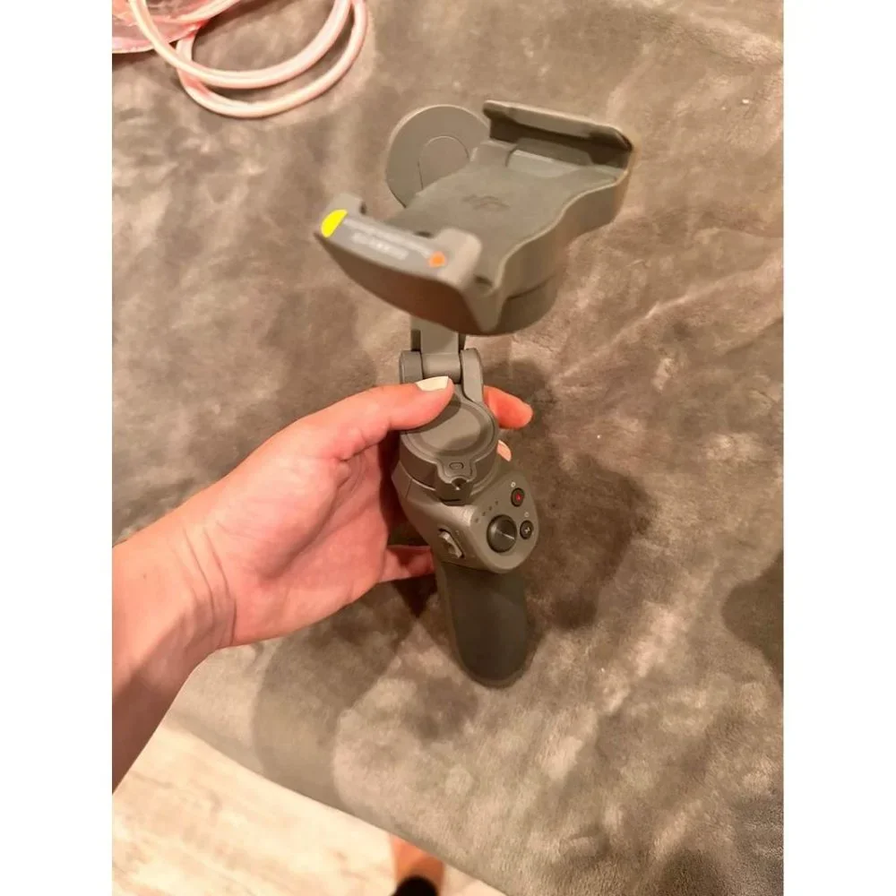 DJI OM 4 - Handheld 3-Axis Smartphone Gimbal Stabilizer with Grip, Tripod,Gimbal
